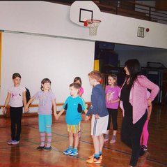 Kate O'Haras kids hold hands in irish dancing class