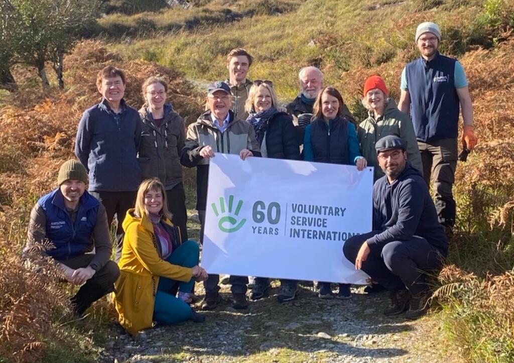 group holding banner mountain 11Oct 2025 (edited)