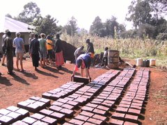 Making bricks for school building project kenya 2009
